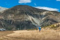 Tourist visiting Castle Hill in Southern Alps, Arthur's Pass, South Island of New Zealand